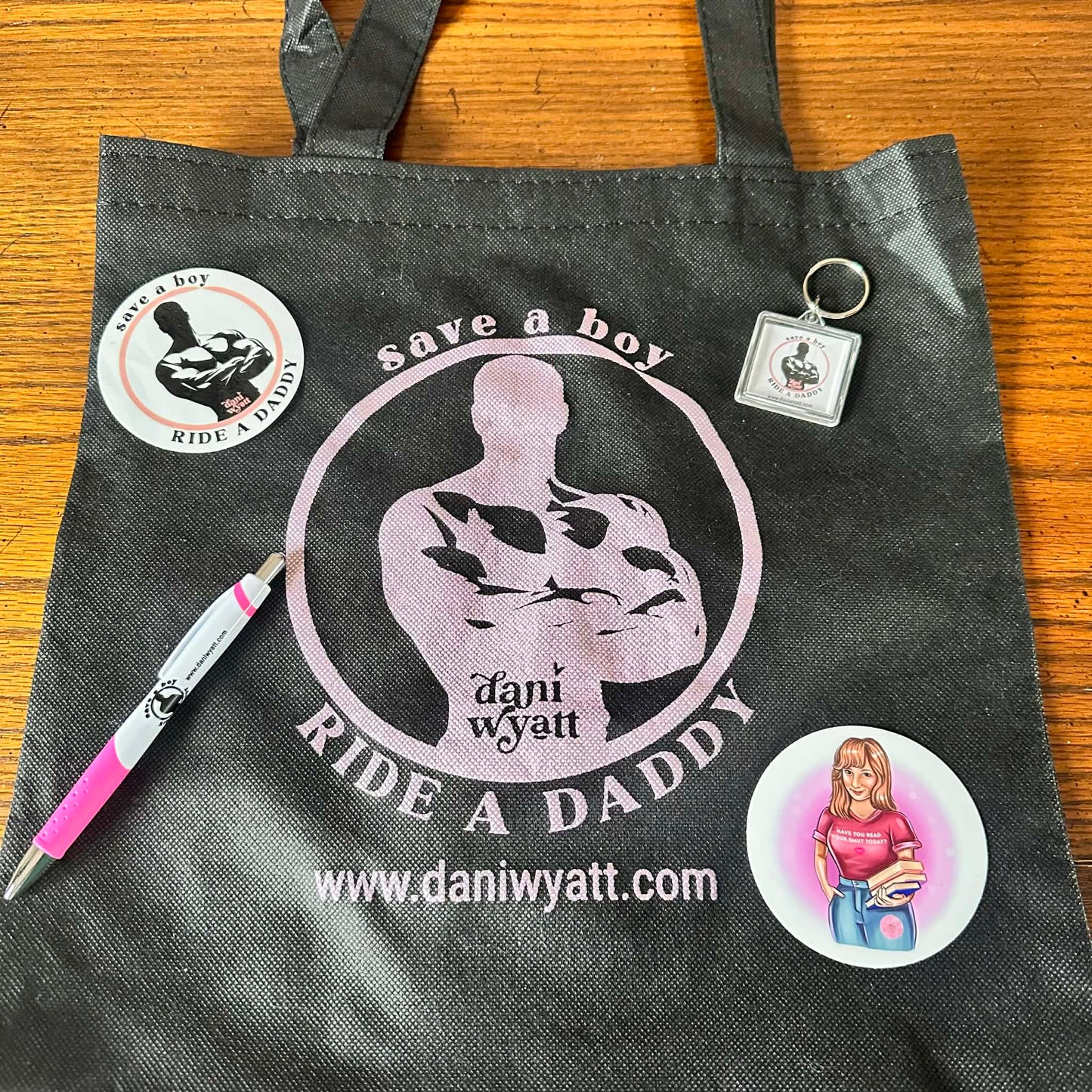 Dani Wyatt Trademarked "Save a Boy, Ride a Daddy" SWAG PACK!